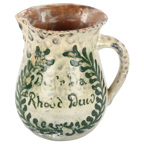 275 - Ewenny pottery jug, with painted inscription 