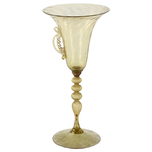 284 - A tall Venetia Murano amber coloured glass in the manner of Salviati, multi-bubble form stem with wi... 