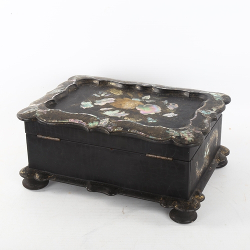 301 - A Victorian papier mache jewel box with inlaid mother-of-pearl decoration, width 25cm