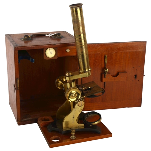 306 - A Victorian brass-mounted microscope by Negretti & Zambra of London, brass spare lenses, mahogany tr... 