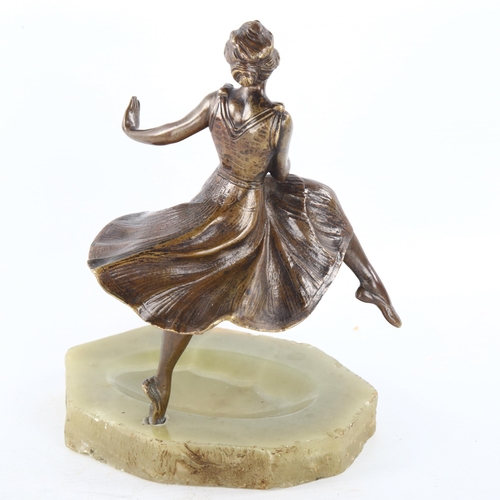 307 - A patinated bronze dancer, circa 1920, on onyx base, unsigned, height 18cm