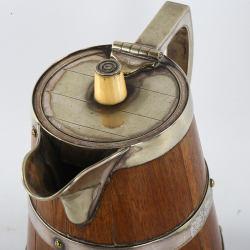 310 - WITHDRAWN - A Victorian oak and silver plate flagon with ivory knop, height 20cm