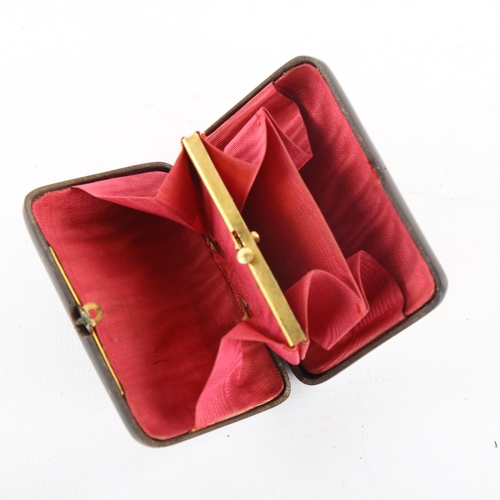 317 - A French 19th century tortoiseshell and gold inlaid purse, with red silk interior, 7cm x 5cm