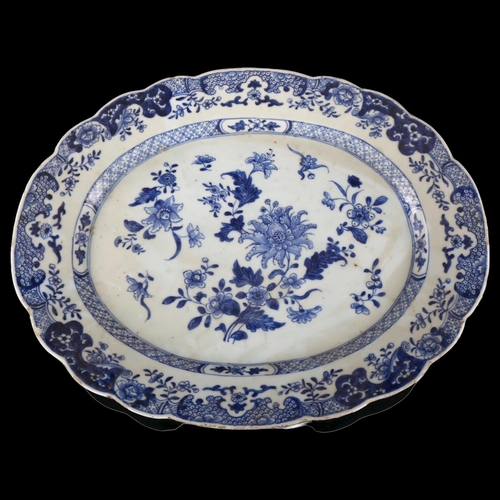 331 - Chinese Nankin blue and white porcelain meat dish, painted decoration and border, 34cm x 28cm