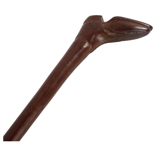 339 - A Victorian Sunday stick, with carved boot design handle