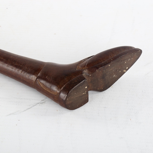 339 - A Victorian Sunday stick, with carved boot design handle