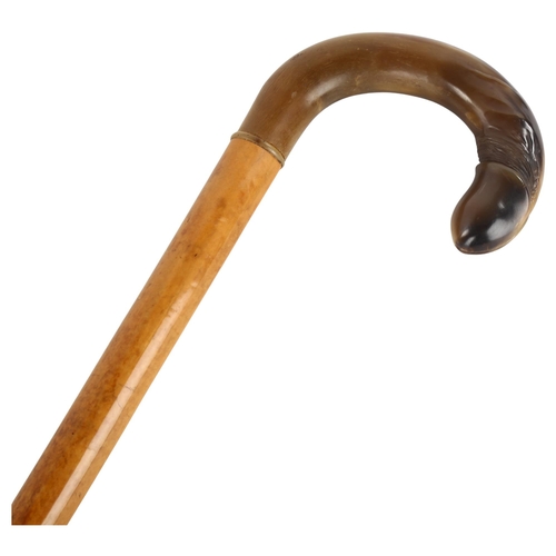 340 - A 19th century phallic carved horn and Malacca walking stick