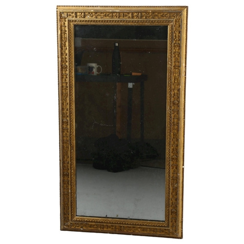 358 - A Victorian gilt-gesso wall mirror, with relief moulded surround, 101cm x 56cm