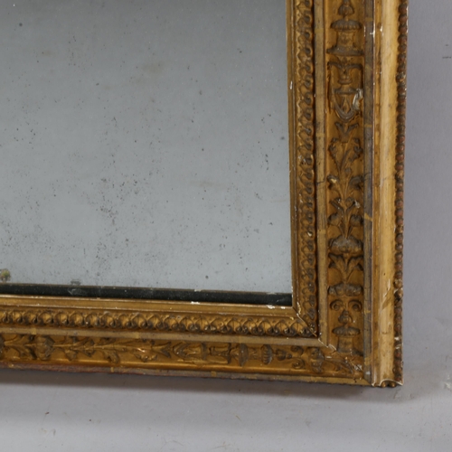 358 - A Victorian gilt-gesso wall mirror, with relief moulded surround, 101cm x 56cm