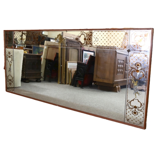 367 - A large decorative bistro wall mirror, with gilded Classical decoration, height 102cm, length 232cm ... 