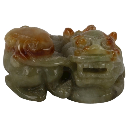 377 - A Chinese miniature carved jade dragon pendant, length 3cm