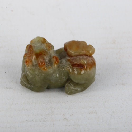 377 - A Chinese miniature carved jade dragon pendant, length 3cm