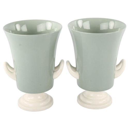 380 - Keith Murray for Wedgwood, a pair of two tone porcelain urns, makers marks to base, height, 20.5cm