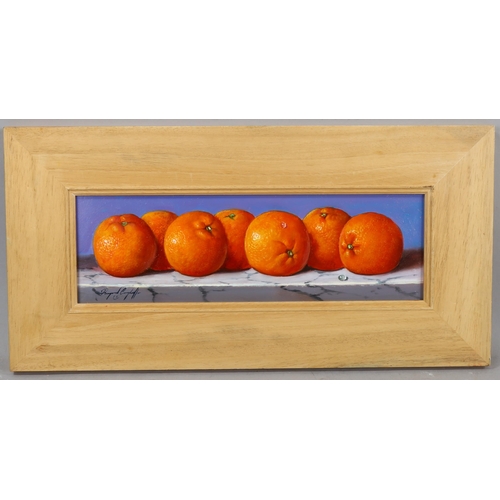 780 - Raymond Campbell, oil on board, oranges, signed, 12cm x 37cm, framed