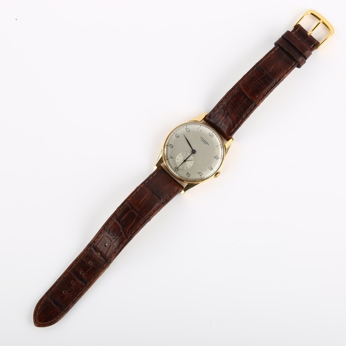 1008 - UNIVERSAL GENEVE - an 18ct gold mechanical wristwatch, ref. 11244, circa 1956, silvered dial with sl... 