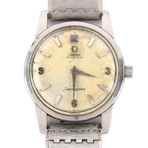 1017 - OMEGA -  a stainless steel Seamaster automatic bracelet watch, ref. 14761, circa 1961, silvered dial... 
