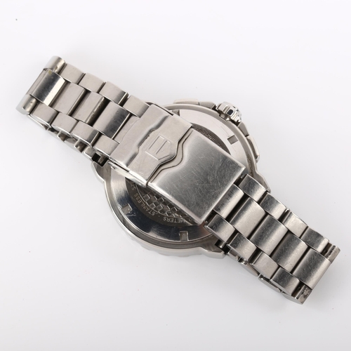 1020 - TAG HEUER - a stainless steel Formula 1 quartz chronograph bracelet watch, ref. CAU1112, black dial ... 