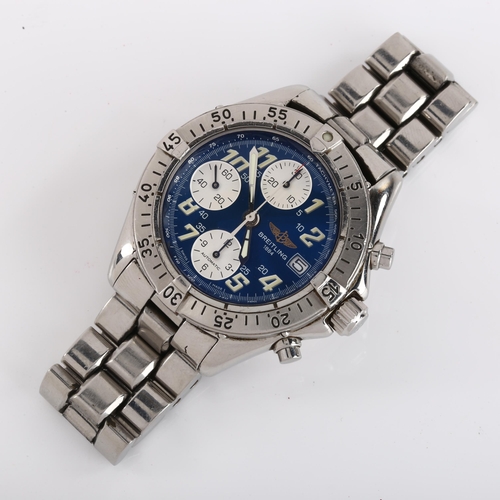 1021 - BREITLING - a stainless steel Colt automatic chronograph bracelet watch, ref. A13335, blue dial with... 