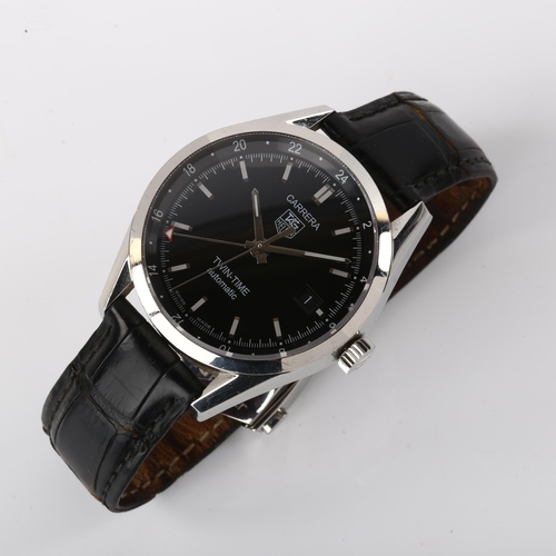 1022 - TAG HEUER - a stainless steel Carrera Twin-Time automatic wristwatch, ref. WV2115, black dial with b... 