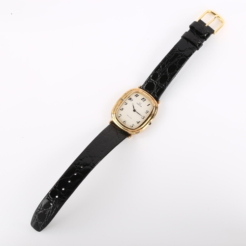 1027 - OMEGA - a gold plated De Ville mechanical wristwatch, ref. 1031VE, circa 1972, white enamel dial wit... 