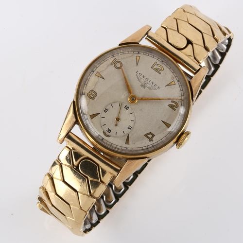 1042 - LONGINES - a mid-20th century 9ct gold mechanical bracelet watch, ref. 17702, circa 1948, silvered d... 