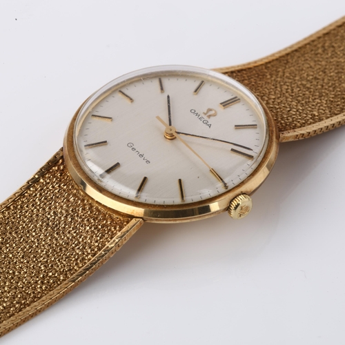 1045 - OMEGA - a Vintage 9ct gold Geneve mechanical bracelet watch, ref. 331/25410, circa 1970, silvered di... 