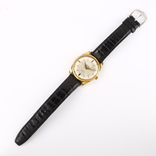 1046 - MUDU - a Vintage gold plated stainless steel automatic wristwatch, silvered dial with gilt baton hou... 