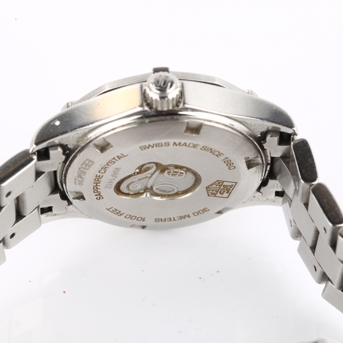 1053 - TAG HEUER - a lady's stainless steel Aquaracer quartz bracelet watch, ref. WAF1412, silvered dial wi... 