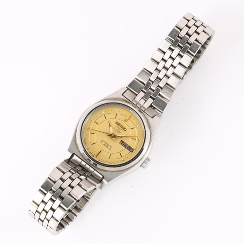 1055 - SEIKO 5 - a lady's stainless steel automatic bracelet watch, ref. 4206-0601, champagne dial with lum... 