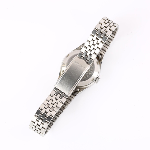 1055 - SEIKO 5 - a lady's stainless steel automatic bracelet watch, ref. 4206-0601, champagne dial with lum... 