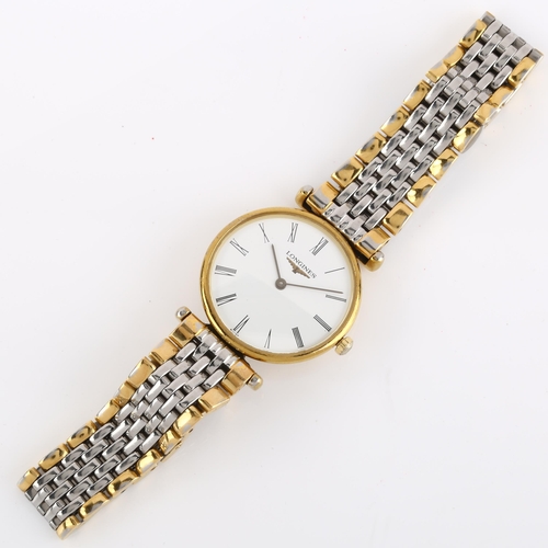 1057 - LONGINES - a lady's gold plated stainless steel La Grande Classique quartz bracelet watch, ref. L4.1... 