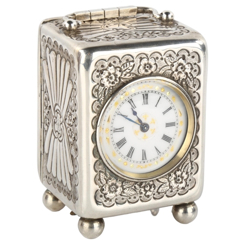 1080 - MAPPIN & WEBB - a 19th century silver miniature carriage clock, white enamel dial with Roman numeral... 