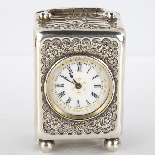 1080 - MAPPIN & WEBB - a 19th century silver miniature carriage clock, white enamel dial with Roman numeral... 