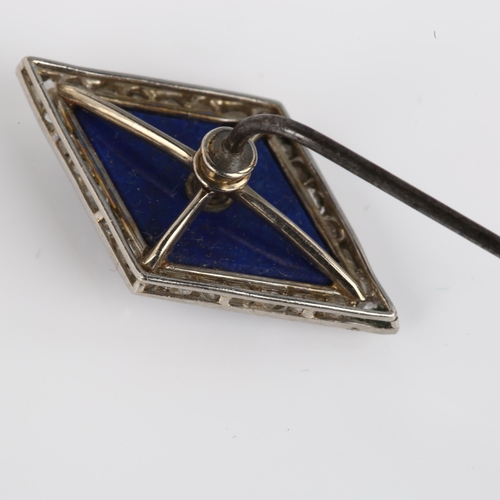 1104 - An Art Deco lapis lazuli and diamond lozenge stickpin, unmarked white metal settings with old Europe... 