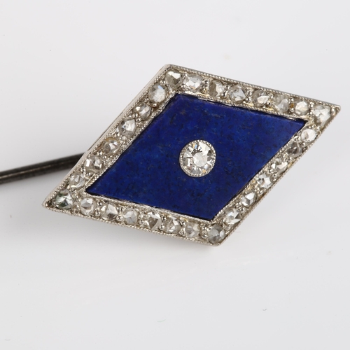 1104 - An Art Deco lapis lazuli and diamond lozenge stickpin, unmarked white metal settings with old Europe... 