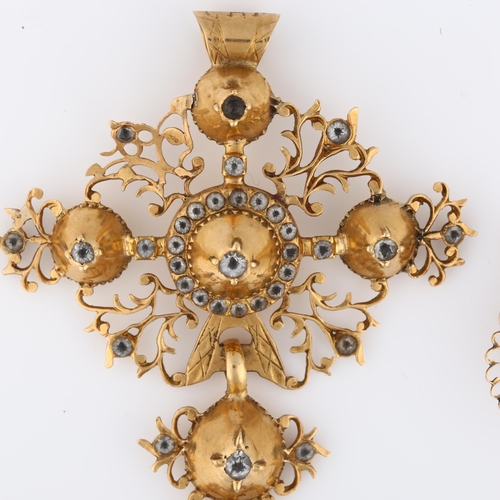 1107 - A Georgian paste Norman cross pendant, unmarked gold openwork settings with reverse mounted paste an... 