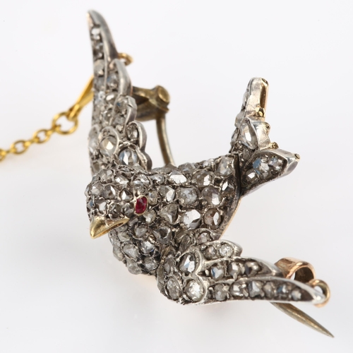 1110 - A late Victorian ruby and diamond swallow bird brooch, 3-dimensionally formed and pave set with rose... 