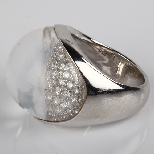 1115 - An 18ct white gold rock crystal and diamond bombe ring, set with domed rock crystal and modern round... 