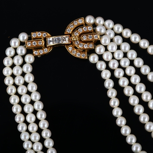 1122 - BOUCHERON - an 18ct gold multi-strand pearl and diamond necklace, the graduated pearls ranging from ... 