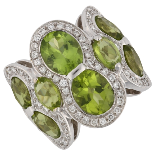 1123 - A large Italian 18ct white gold peridot and diamond cluster cocktail ring, set with oval mixed-cut p... 