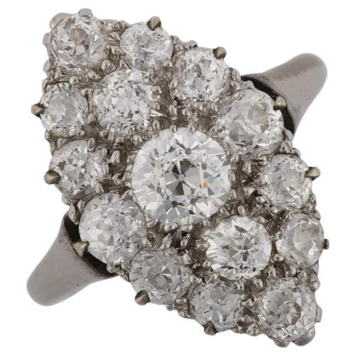 1125 - A diamond marquise cluster ring, unmarked white metal settings with old European-cut diamonds, total... 