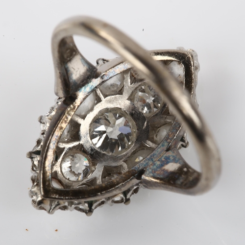 1125 - A diamond marquise cluster ring, unmarked white metal settings with old European-cut diamonds, total... 