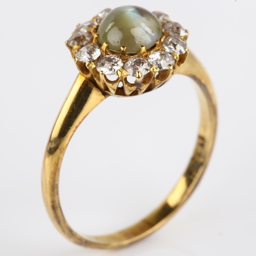 1127 - An Antique 18ct gold cat's eye chrysoberyl and diamond cluster ring, set with round cabochon chrysob... 