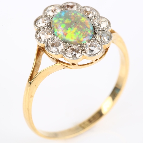 1130 - An 18ct gold black opal and diamond cluster ring, set with oval cabochon black opal and old European... 