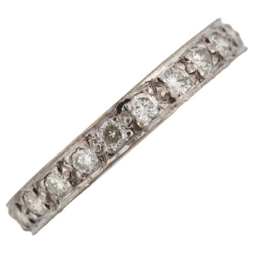 1132 - A full eternity diamond ring, unmarked white metal settings with modern round brilliant-cut diamonds... 