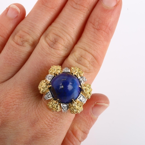 1134 - A large 18ct gold lapis lazuli and diamond cocktail ring, textured claw setting with high bullet cab... 