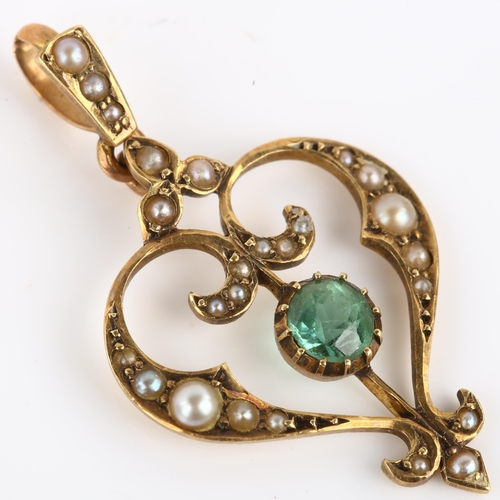 1135 - An Art Nouveau Edwardian 15ct gold green paste and split pearl openwork heart pendant, pendant heigh... 