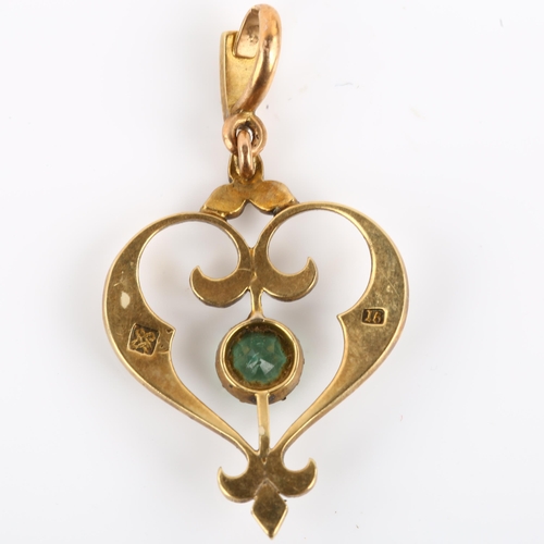 1135 - An Art Nouveau Edwardian 15ct gold green paste and split pearl openwork heart pendant, pendant heigh... 