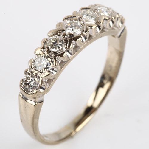 1136 - An 18ct white gold seven stone diamond half eternity ring, set with modern round brilliant-cut diamo... 