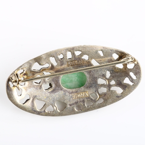 1169 - A Chinese silver and jade Good Fortune brooch, relief embossed and pierced with bat and flower decor... 